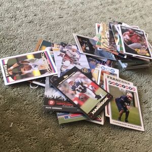 A whole lot of baseball/football/hockey cards